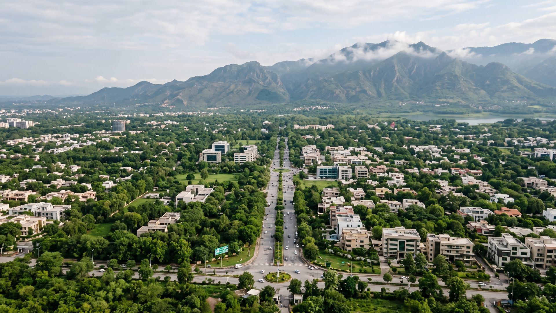 Residential sectors in Islamabad with a road leading out toward the airport